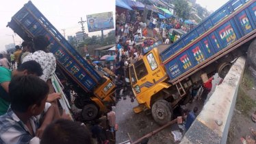ঢাকা-নারায়ণগঞ্জ লিংক রোডে ফ্লাইওভারের রেলিং ঝুলে রইল ট্রাক, নিহত ১